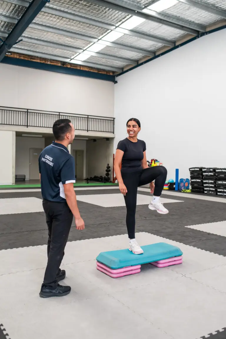 Exercise Physiologist training a client
