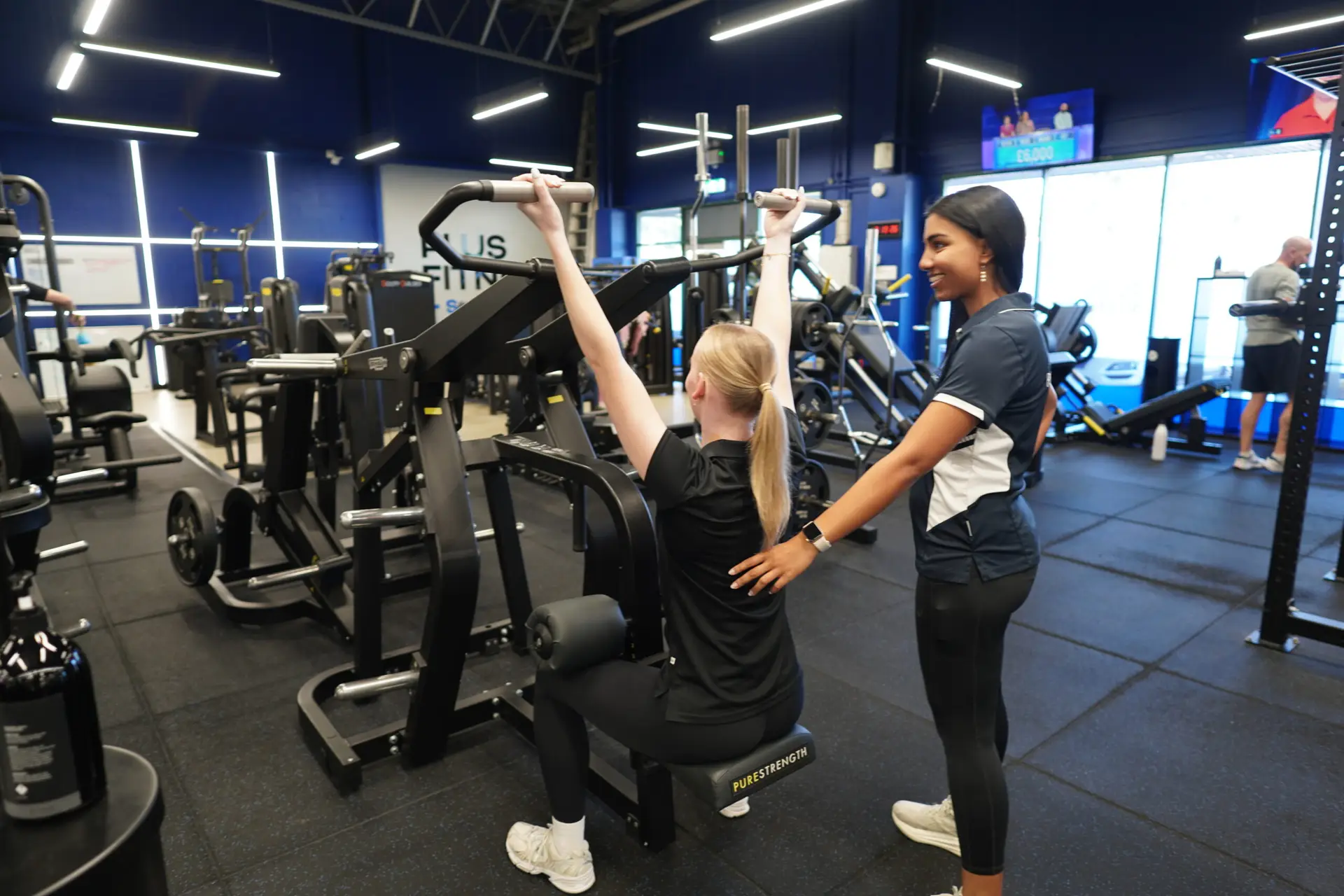 Woman completing supervised strength exercise with an Accredited Exercise Physiologist at Plus Fitness St Marys.